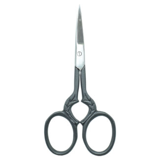 Embroidery scissors with delicate leaf print designs for crafting projects.